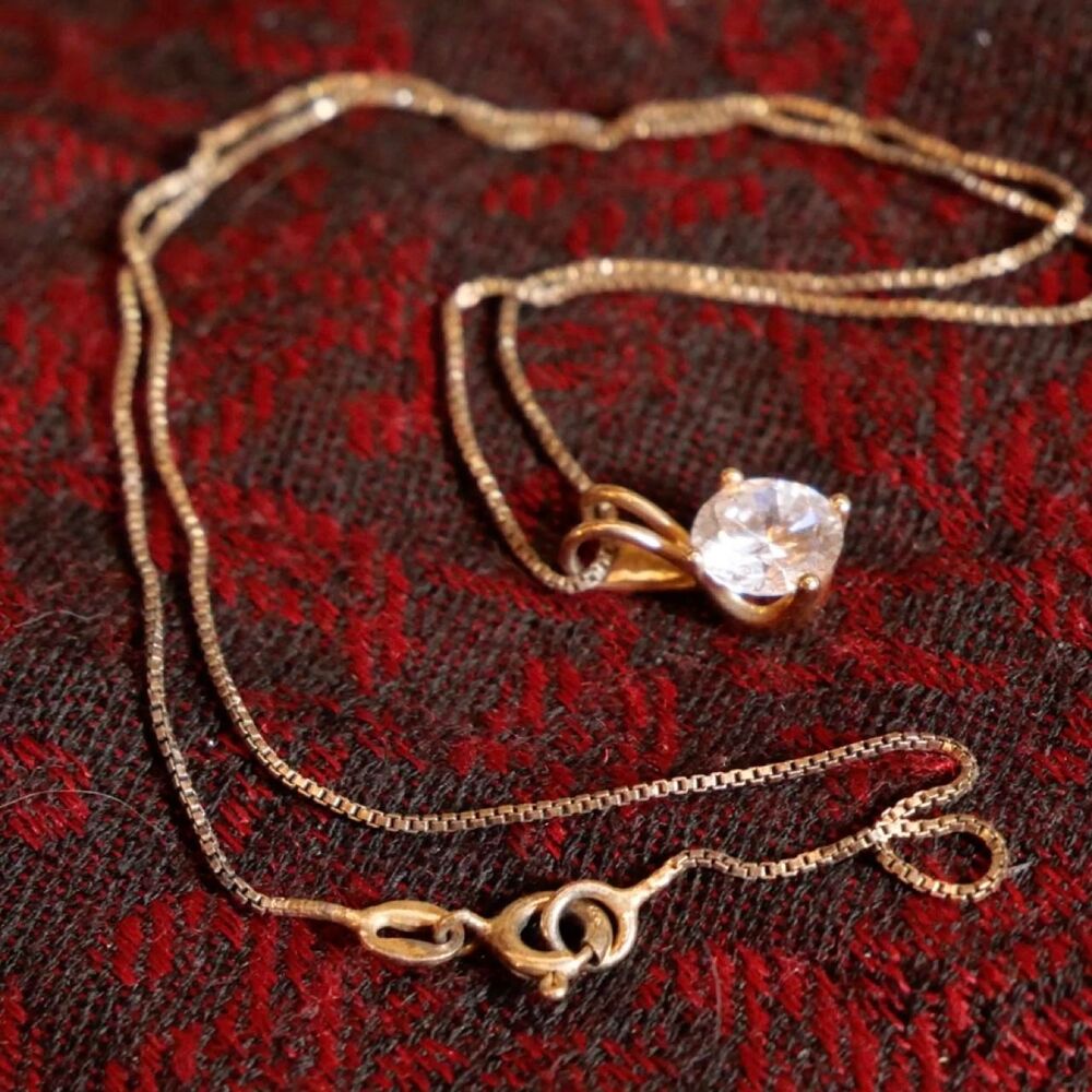 925 sterling gold finish silver necklace with large white stone